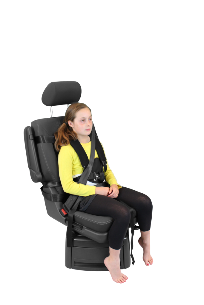 Child secured in a Houdini harness, showing in-flight support for safe, stable postural positioning during air travel.