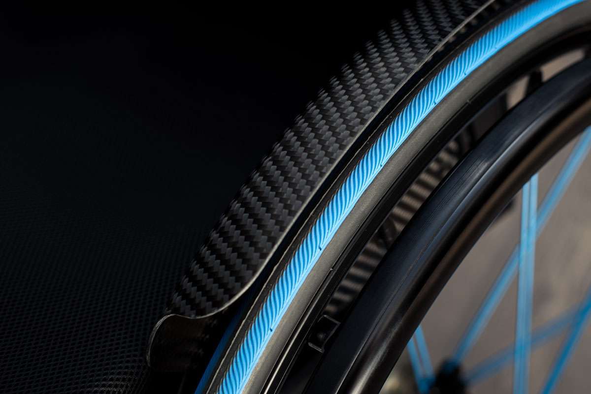 Macro shot of blue wheelchair rim