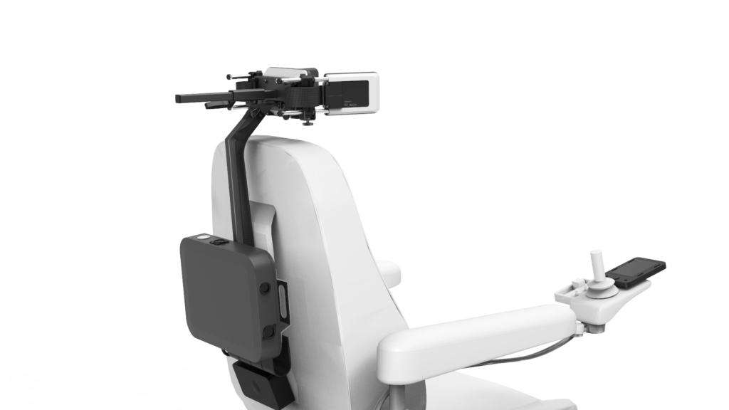 Rear view of a powered wheelchair featuring CoMoveIT -an advanced head control system mounted behind the headrest, with a control module on the armrest and a compact computing unit on the back. The system appears designed for individuals with limited hand mobility, enabling head-based driving or interaction.