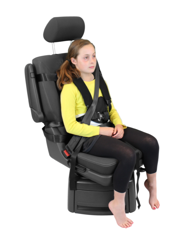 Child secured in a Houdini harness, showing in-flight support for safe, stable postural positioning during air travel
