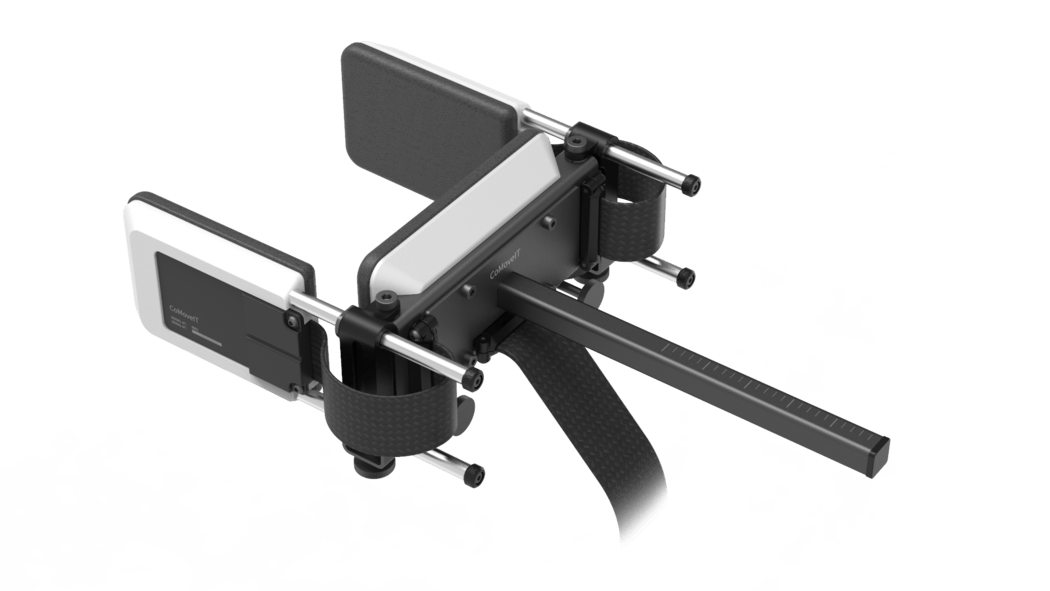 Ariel sideways image of the CoMoveIT Steering system, highlighting its black and white design, white handle, and support components.