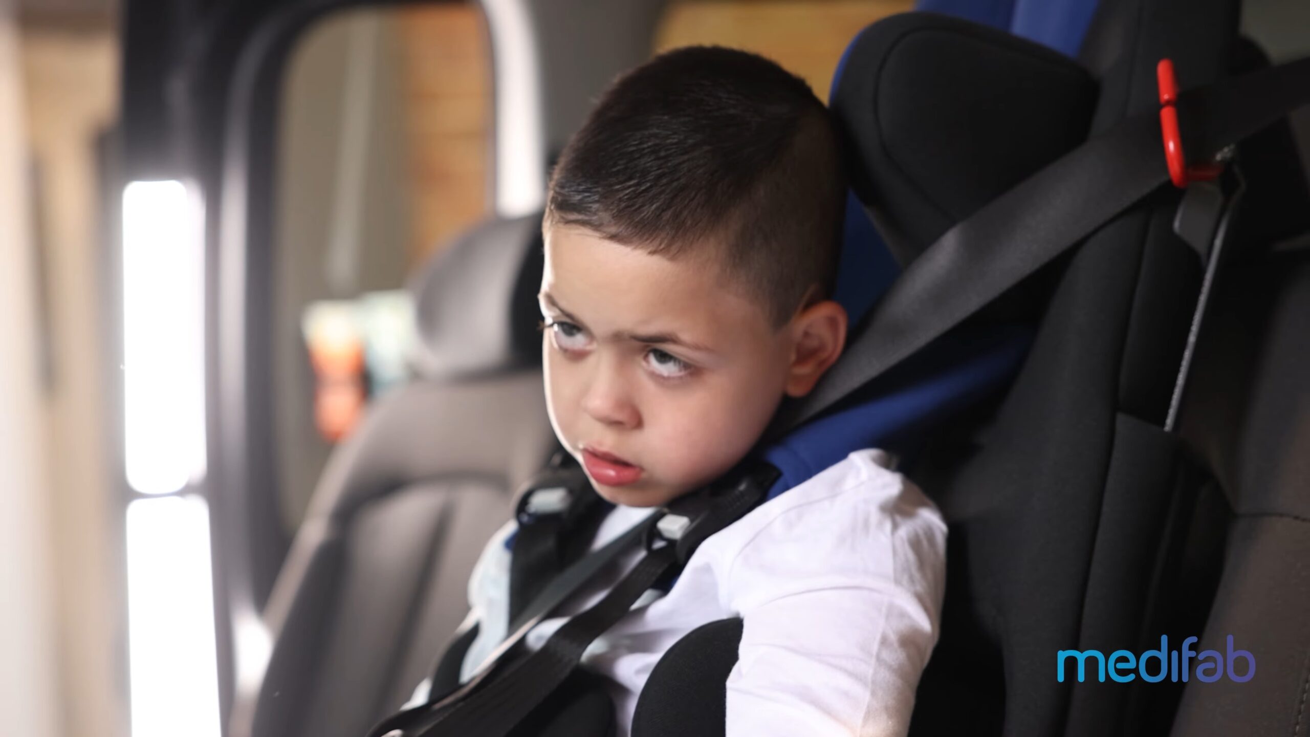 Child displaying the use of Kidsflex Car Seat