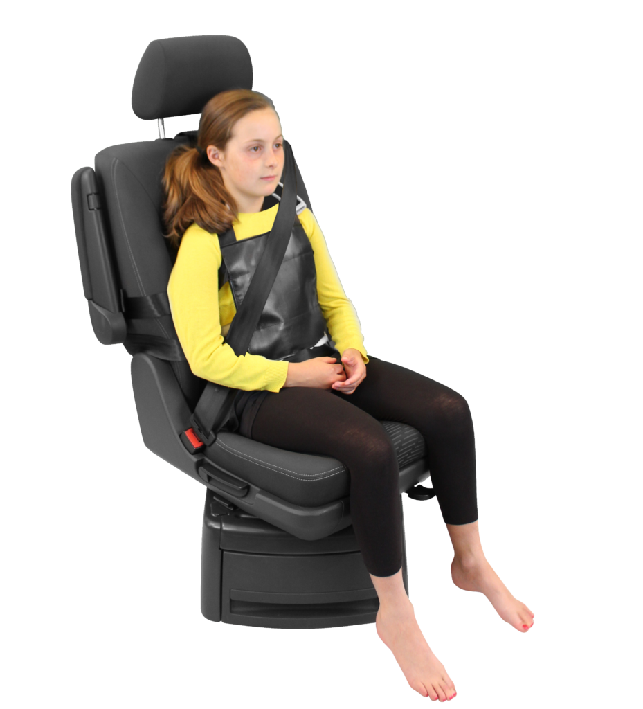 Houdini 13 harness being modeled by a young girl, providing secure postural support in vehicles.