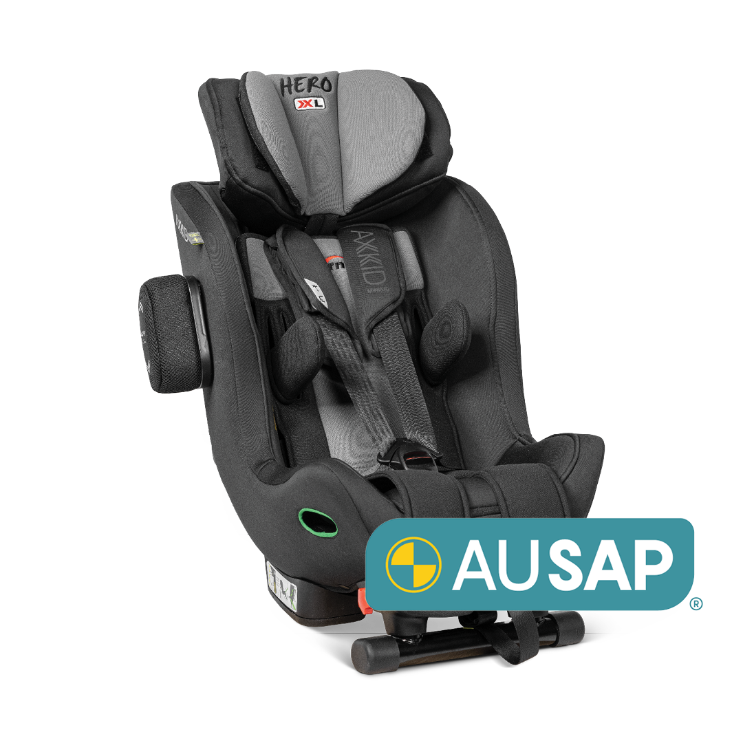 Hero-XL branded car seat on a white background diagonally facing the right with a green AuSAP logo in the right hand corner. 