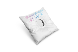 SleepShape Cushion 13.1 (Ear Protection) shown with white comfy cover. Tilted to the left.